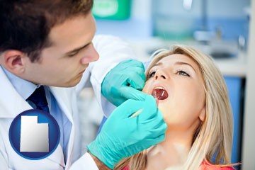 a dentist examining teeth - with Utah icon