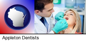 Appleton, Wisconsin - a dentist examining teeth