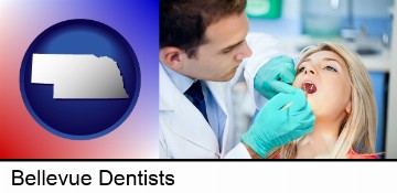 a dentist examining teeth in Bellevue, NE