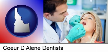 a dentist examining teeth in Coeur D Alene, ID
