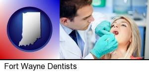 Fort Wayne, Indiana - a dentist examining teeth