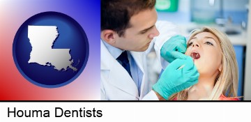 a dentist examining teeth in Houma, LA