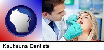 a dentist examining teeth in Kaukauna, WI