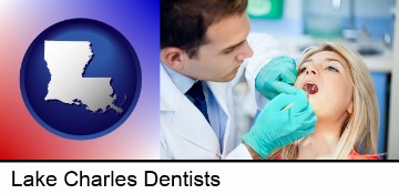 a dentist examining teeth in Lake Charles, LA