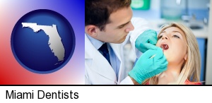 Miami, Florida - a dentist examining teeth