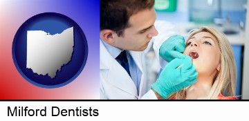 a dentist examining teeth in Milford, OH