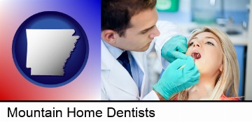 a dentist examining teeth in Mountain Home, AR