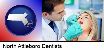 a dentist examining teeth in North Attleboro, MA