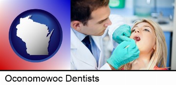 a dentist examining teeth in Oconomowoc, WI