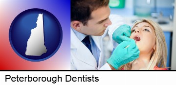 a dentist examining teeth in Peterborough, NH