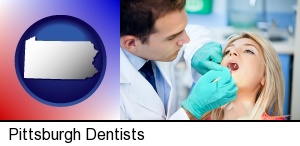 Pittsburgh, Pennsylvania - a dentist examining teeth