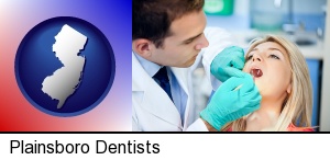 a dentist examining teeth in Plainsboro, NJ