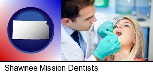 Shawnee Mission, Kansas - a dentist examining teeth