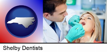 a dentist examining teeth in Shelby, NC