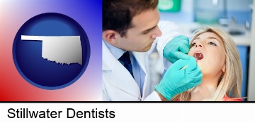 a dentist examining teeth in Stillwater, OK