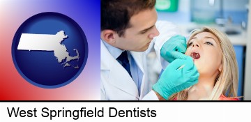 a dentist examining teeth in West Springfield, MA