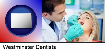 a dentist examining teeth in Westminster, CO