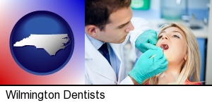 Wilmington, North Carolina - a dentist examining teeth