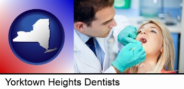 a dentist examining teeth in Yorktown Heights, NY