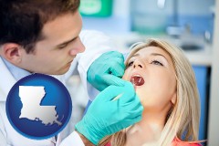 a dentist examining teeth - with LA icon